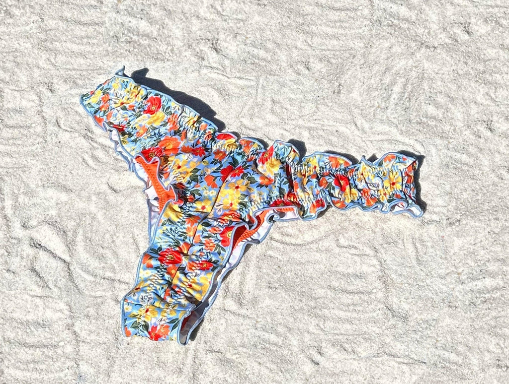 Floral ruffled recycled sustainable bikini bottom lettuce hem thong v waist high cut cheeky medium full coverage