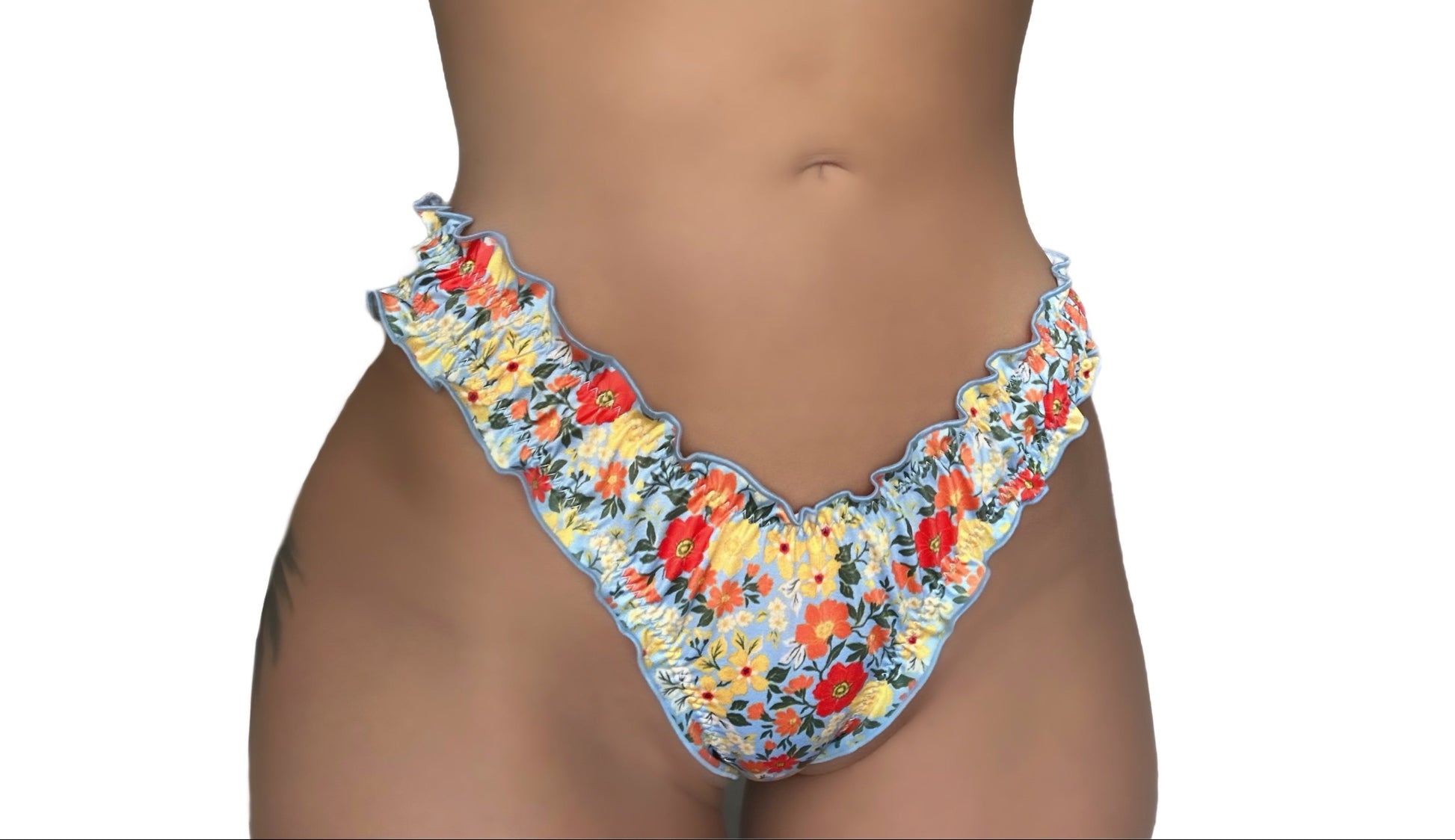 Floral ruffled recycled sustainable bikini bottom lettuce hem thong v waist high cut