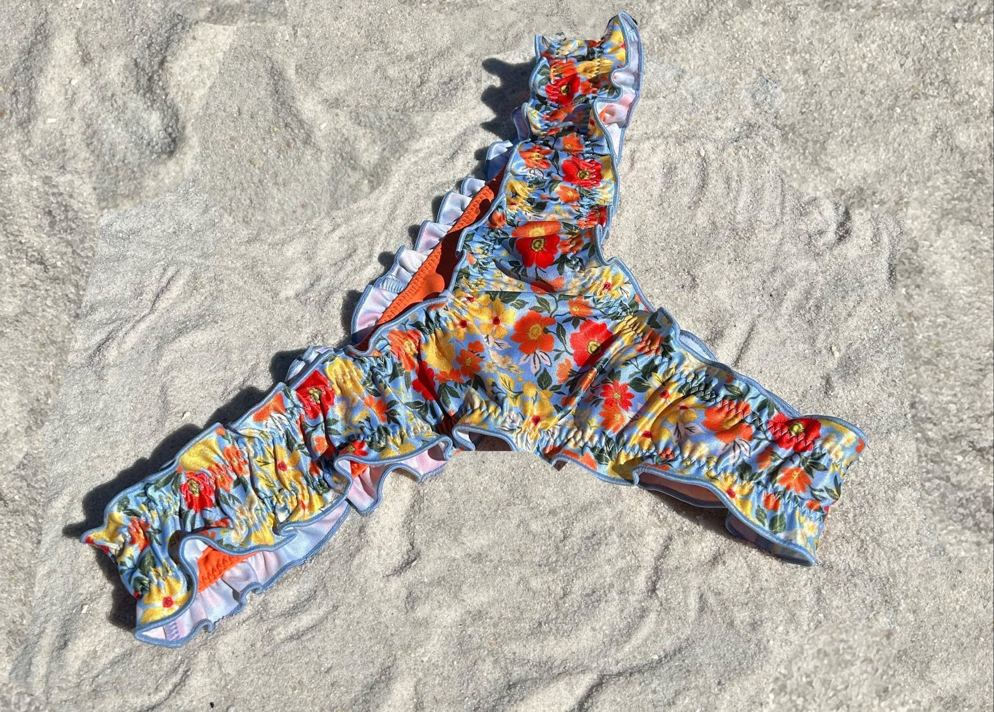 Floral ruffled recycled sustainable bikini bottom lettuce hem thong v waist high cut cheeky medium full coverage