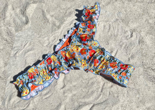 Floral ruffled recycled sustainable bikini bottom lettuce hem thong v waist high cut cheeky medium full coverage