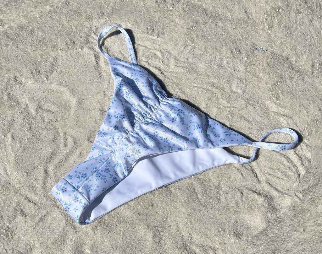 White floral ruched string recycled sustainable bikini thong bottom mid rise high cut cheeky medium moderate coverage