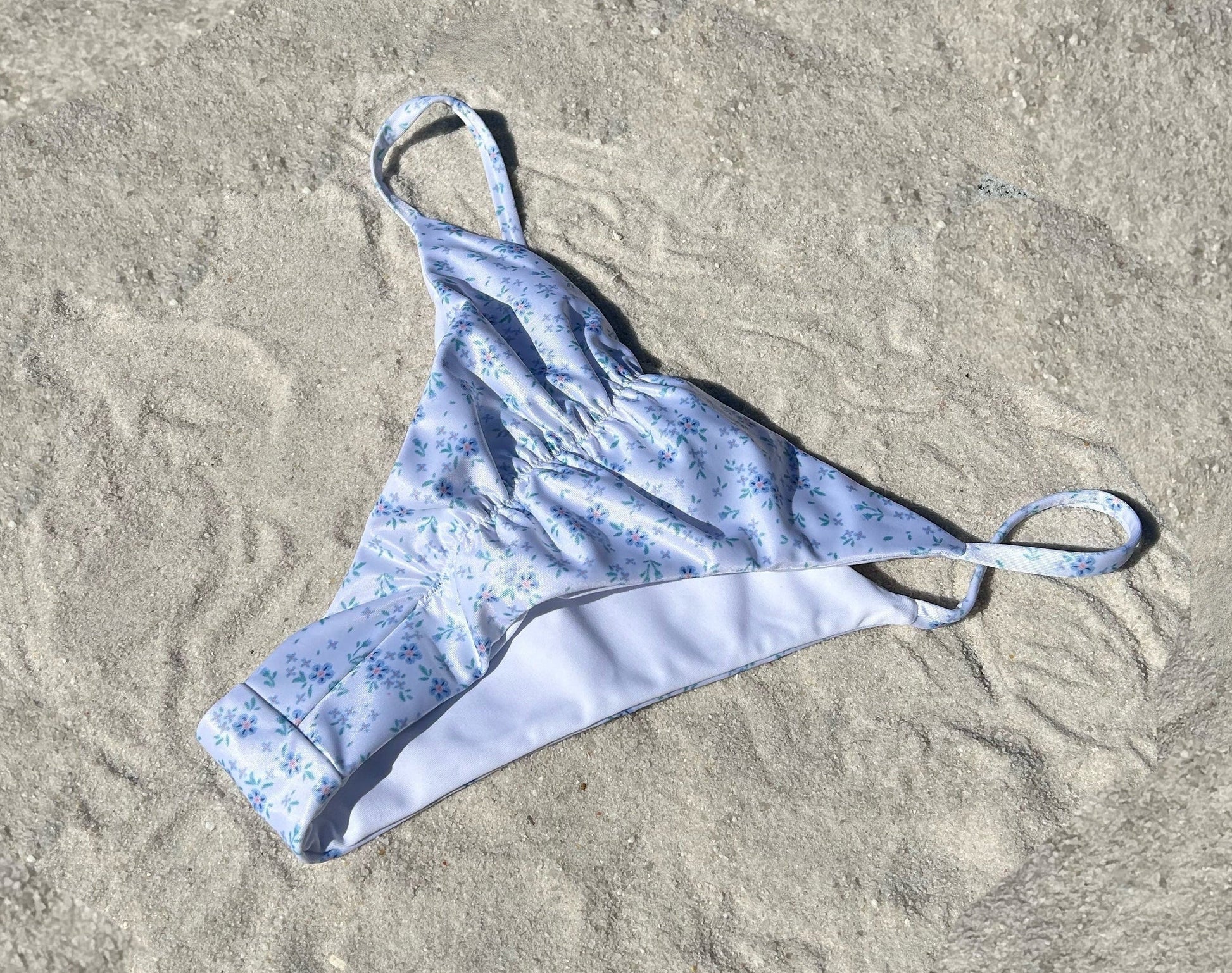 White floral ruched string recycled sustainable bikini thong bottom mid rise high cut cheeky medium moderate coverage