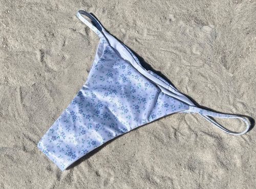 White floral ruched string recycled sustainable bikini thong bottom mid rise high cut cheeky medium moderate coverage